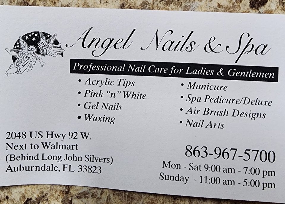 Acrylic nails shaped at a salon station.